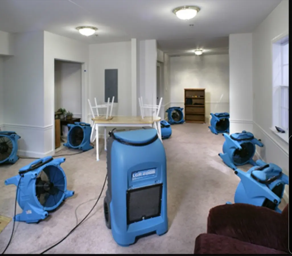 Air movers and dehumidifier setup for Water Damage Restoration in Kenmore